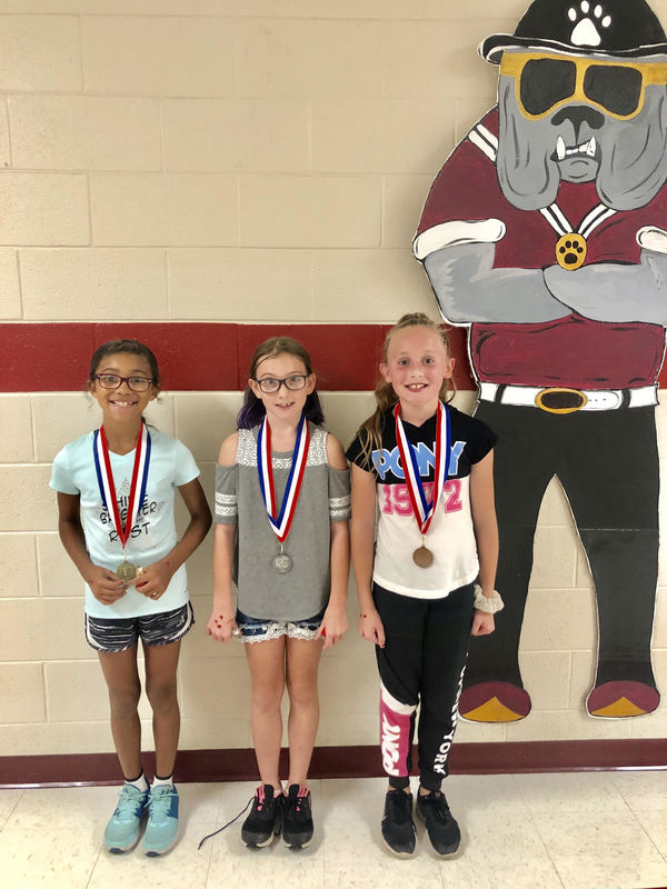 ELEMENTARY STUDENTS RECEIVE MILE CLUB MEDALS